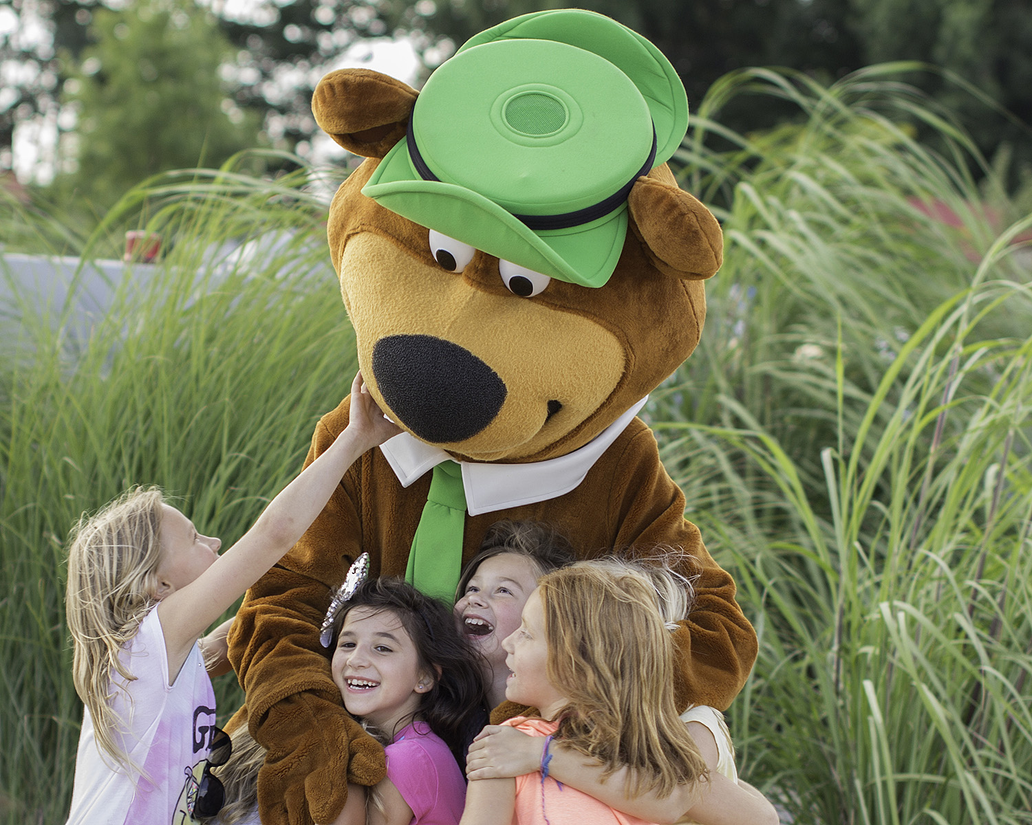 Yogi Bear with kids at Jellystone Park